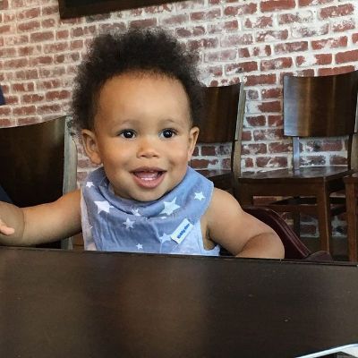 Hunter is wearing a sleeveless blue color cloth with stars shaped design.